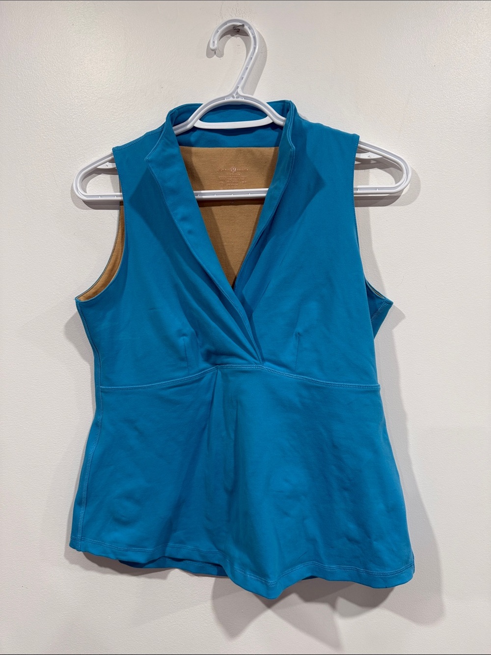 lululemon athletica Teal Sleeveless workout shirt. Built in bra.
